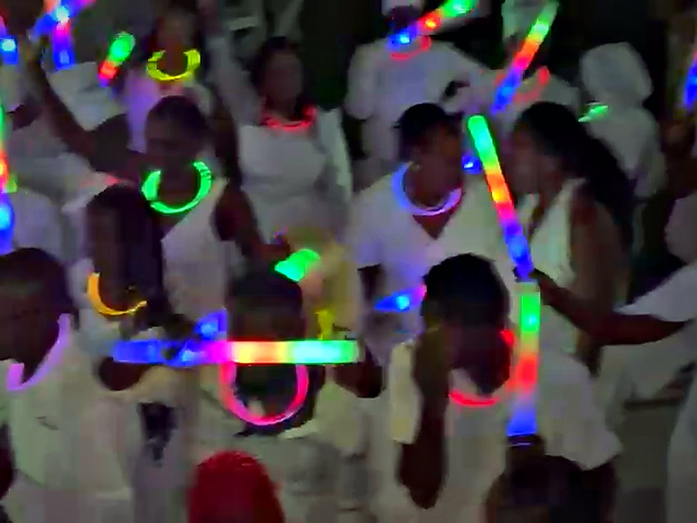 Guests celebrating in white